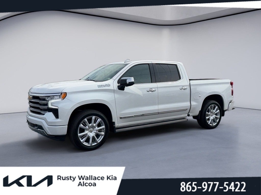 2024 Chevrolet Silverado High Country in Iridescent Pearl Tricoat — front three-quarter view