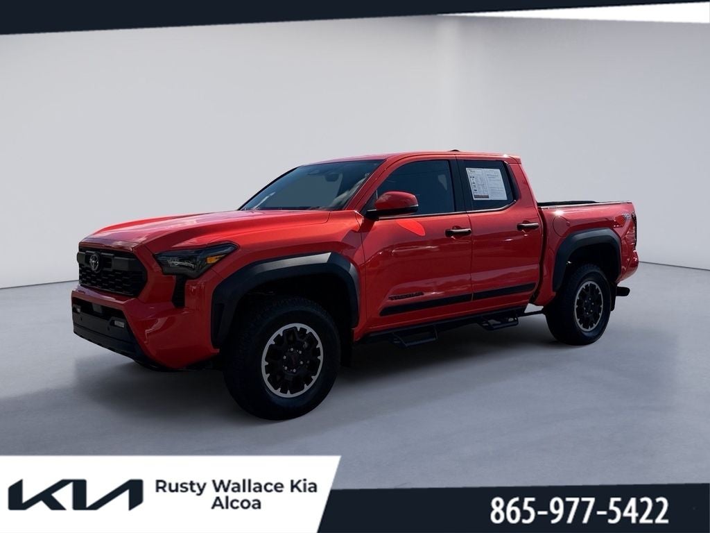 2024 Toyota Tacoma TRD Off Road in Solar Octane — front three-quarter view