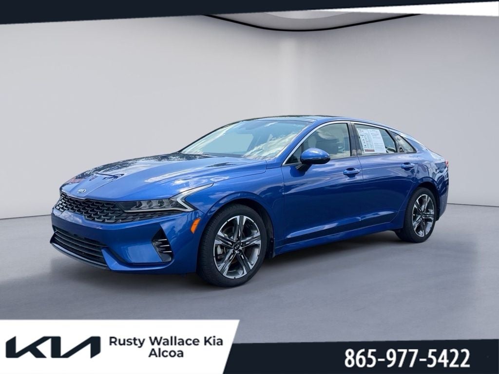 2021 Kia K5 EX in Sapphire Blue — front three-quarter view