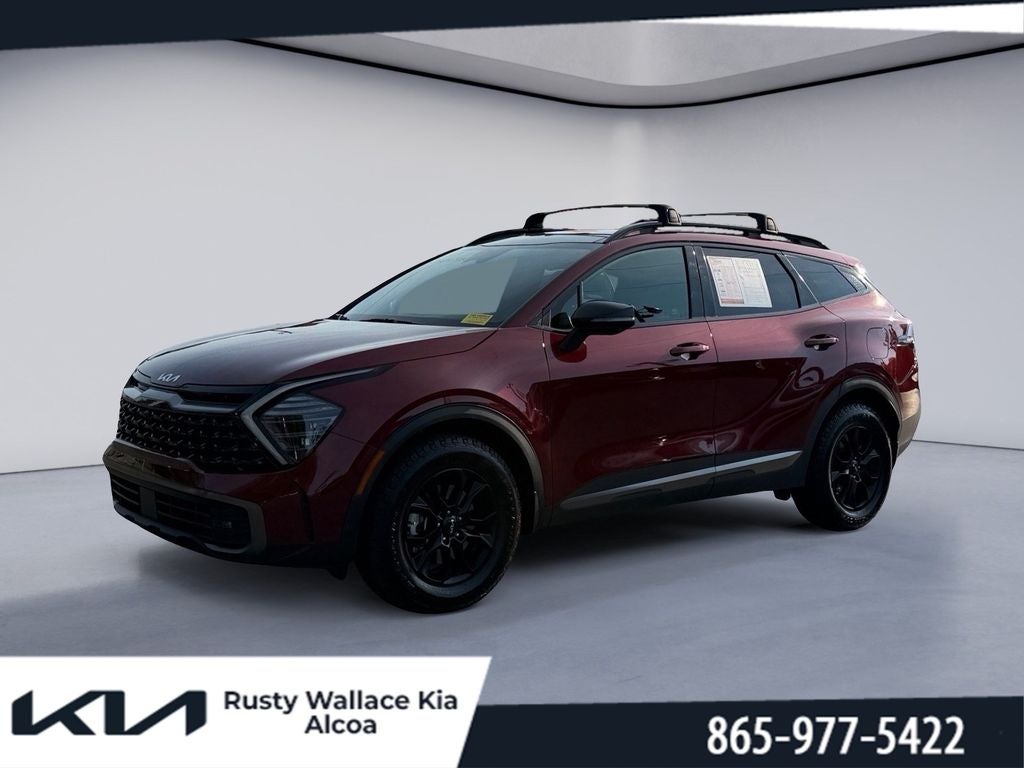 2024 Kia Sportage X-Pro Prestige in Dawning Red — front three-quarter view