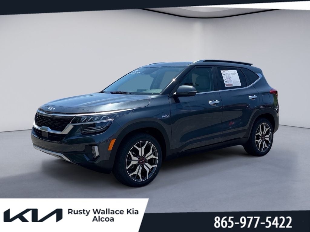 2022 Kia Seltos SX in Gravity Gray — front three-quarter view