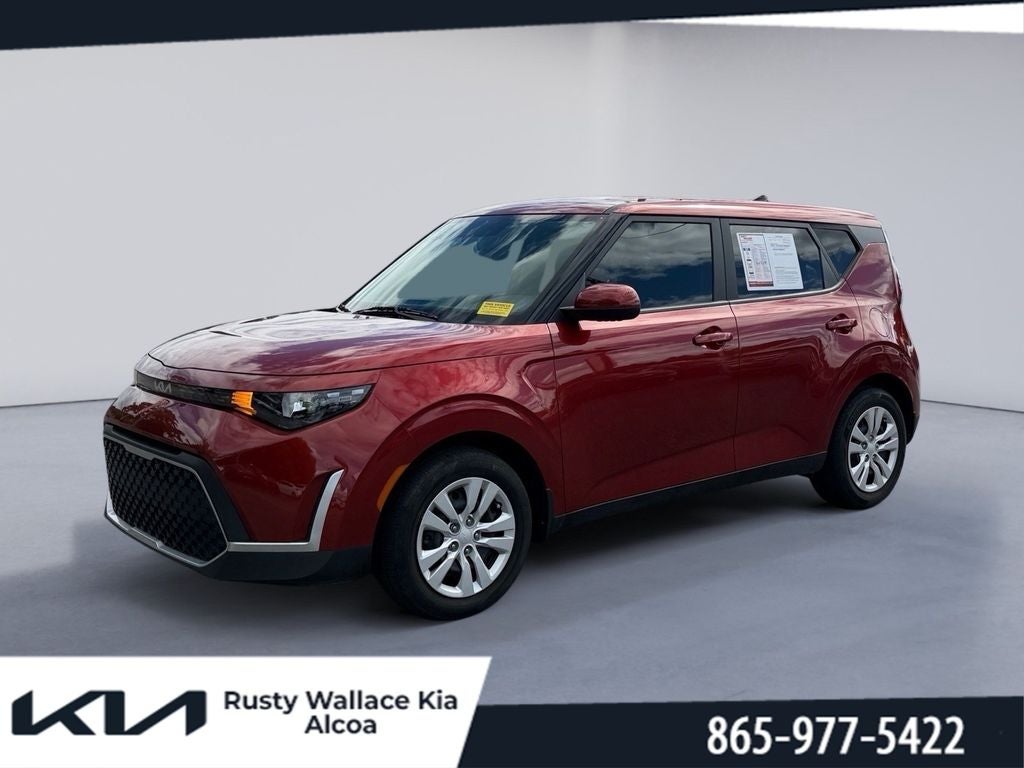 2023 Kia Soul LX in Mars Orange — front three-quarter view