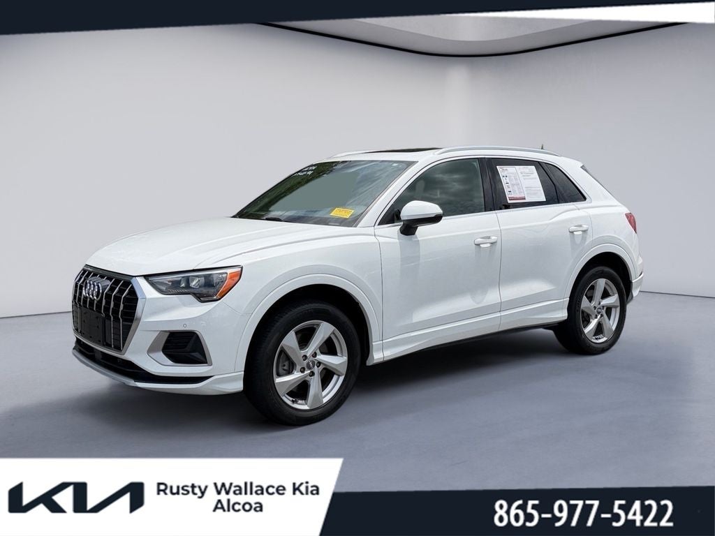 2019 Audi Q3 Premium in Ibis White — front three-quarter view