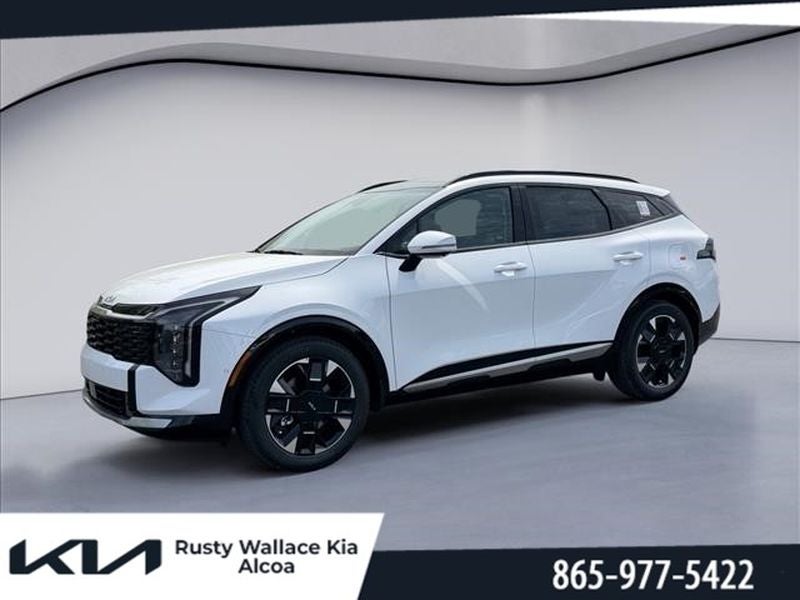 2026 Kia Sportage SX-Prestige in Glacial White Pearl — front three-quarter view