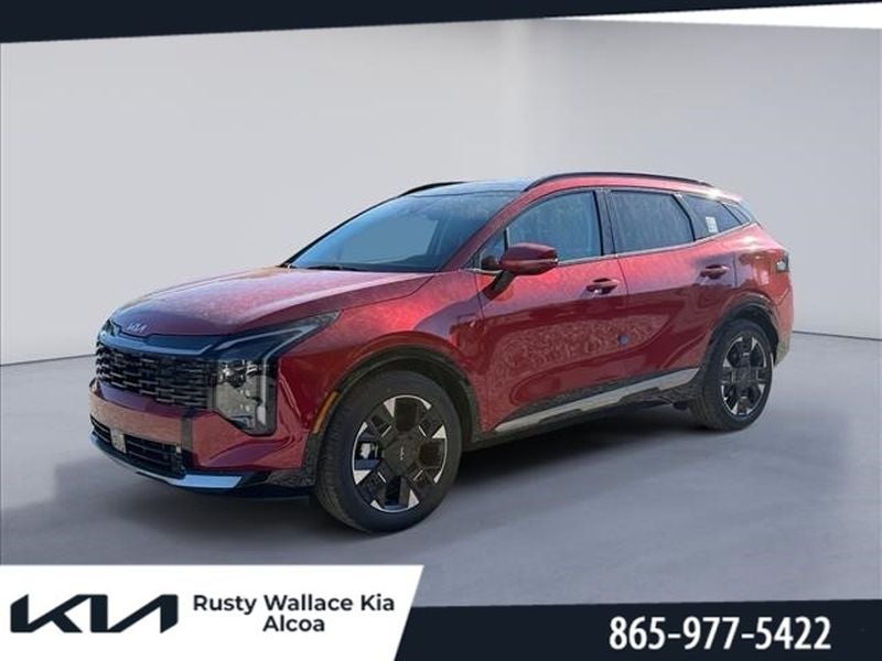 2026 Kia Sportage SX-Prestige in Runway Red — front three-quarter view