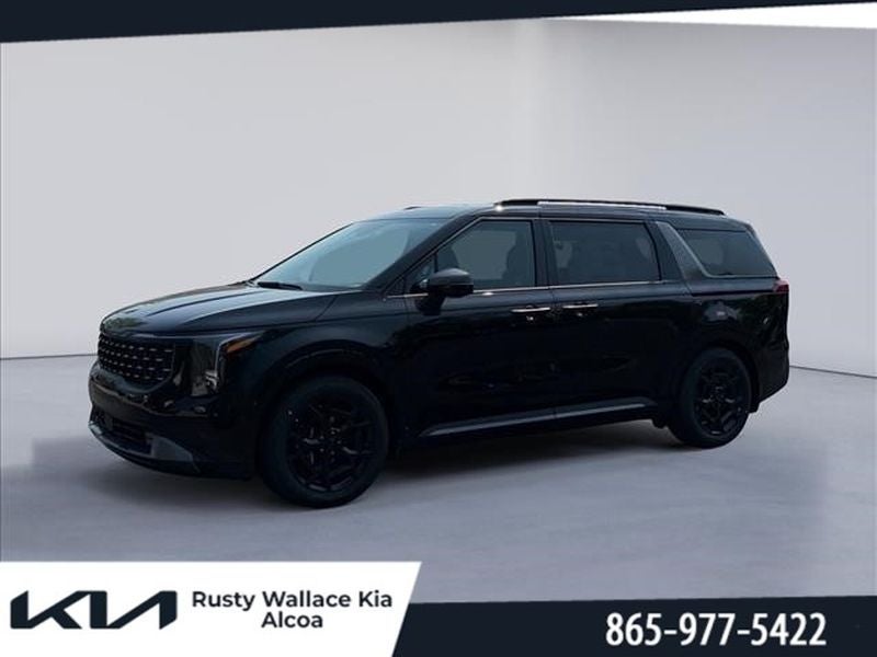 2026 Kia Carnival SX in Panthera Metal — front three-quarter view
